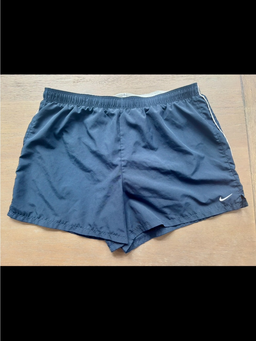Nike Women's Dark Blue Athletic Shorts with Reflective Swoosh